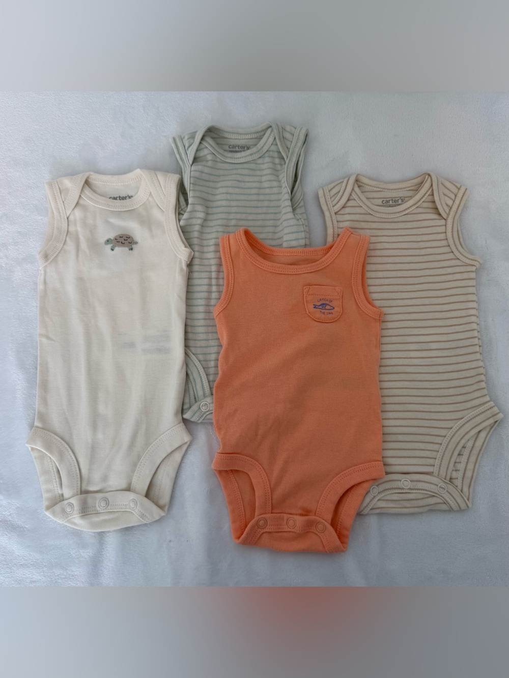 4 Carter's Sleeveless Baby Bodysuit